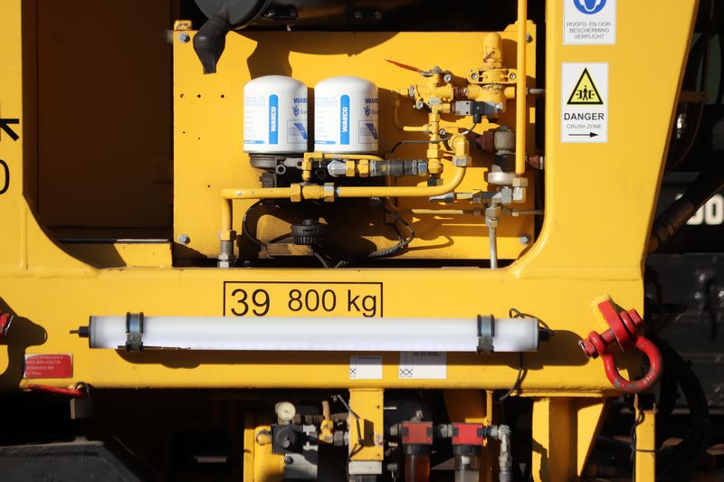 BAM Stopmachine met het fabrieksnummer 1214 en het UIC-nummer 99 84 942 8 702-7.